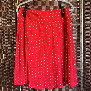 Pleated red polka dot skirt